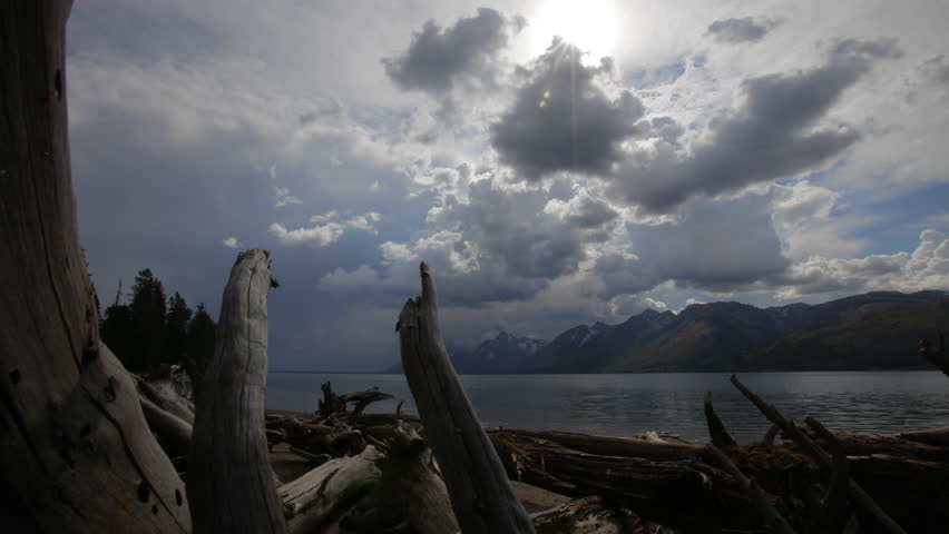 Time lapse of threatening storm clouds gathering over a lake in Yellowstone National Park, Wyoming