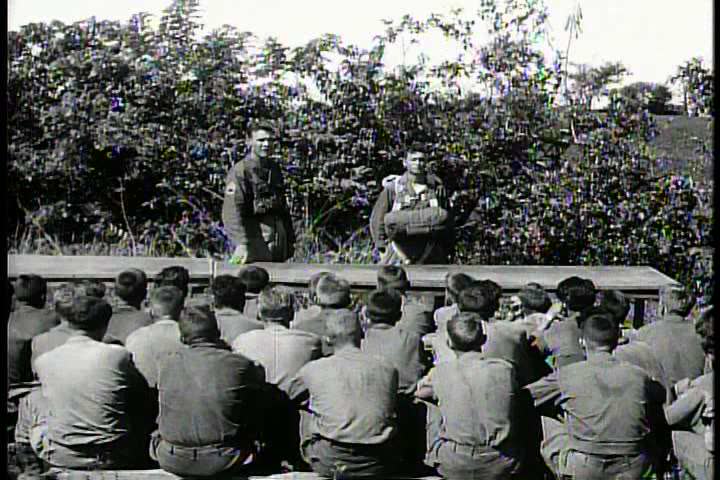 1940s - Parachute training by the U.S. Army as paratroopers parachute into the Philippines.