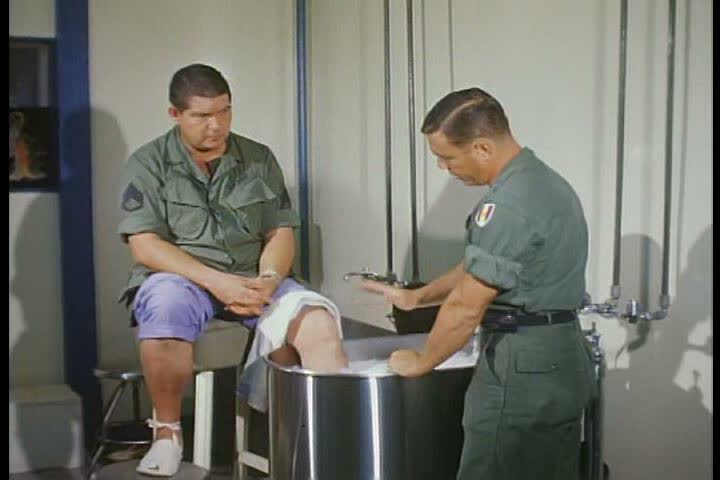 1960s - Injured and wounded soldiers are treated during the Vietnam War. | Shutterstock HD Video #4330553