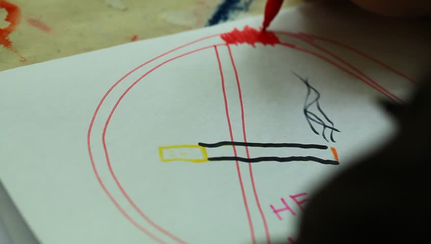 child draws a no smoking sign