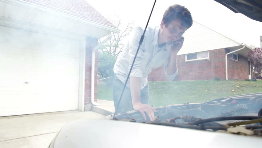 under car hood smoking