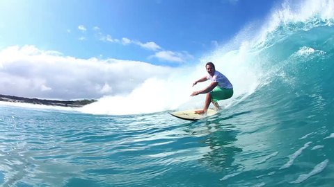 Surfer Riding Blue Ocean Wave Watershot
