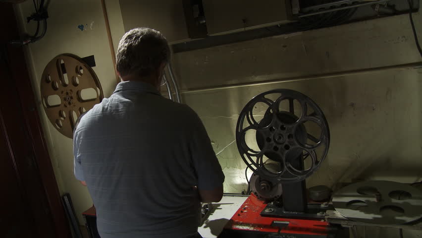 Projectionist making an edit in a 35mm film print.