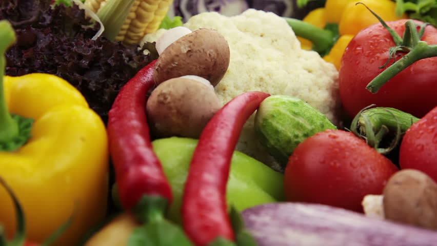 Fresh vegetables: cabbage, carrot, corn, cucumber, garlic, onion, pepper,