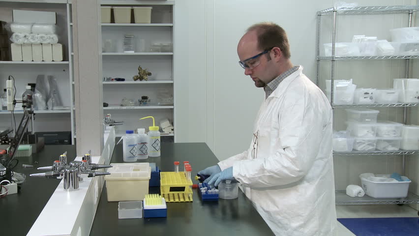 Male scientist doing routine laboratory work.