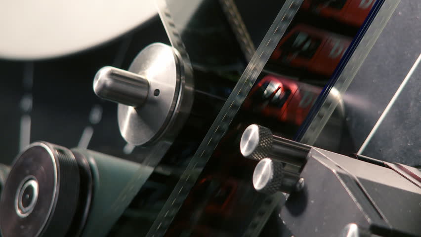 35mm film moving through a telecine machine, which digitizes the images and