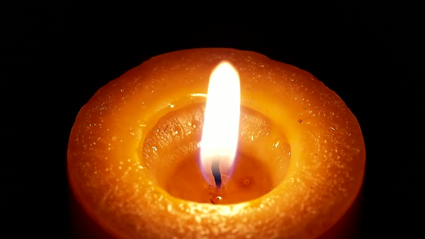 Orange candle burning.