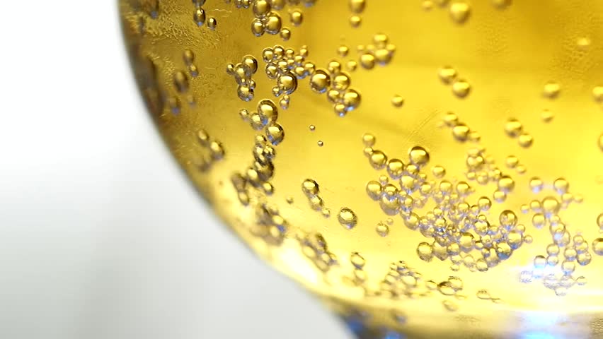 Glass of beer or spakling wine with bubbles