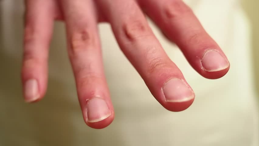 Closeup shot of the fingers of a man