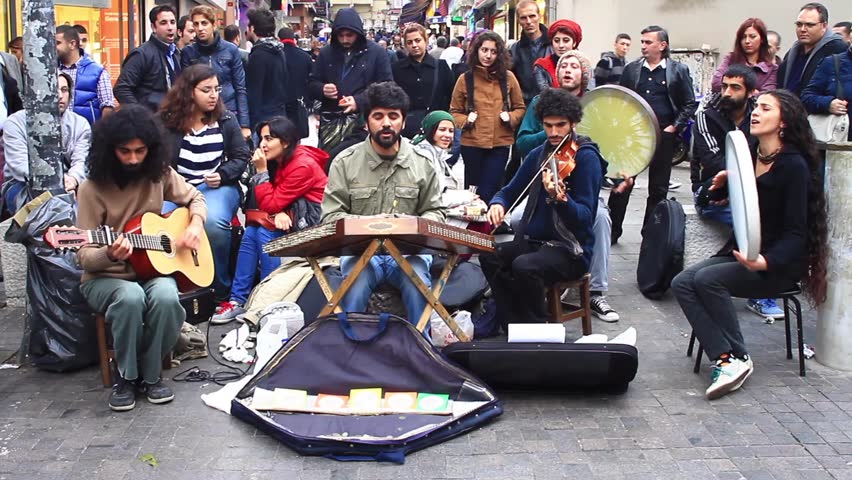 ISTANBUL - NOV 17: Unidentified street musicians perform live at Kadikoy on