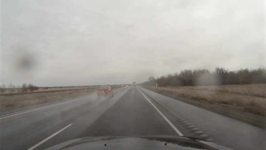 Driving view changing lanes and passing a truck on Interstate 84 heading east in