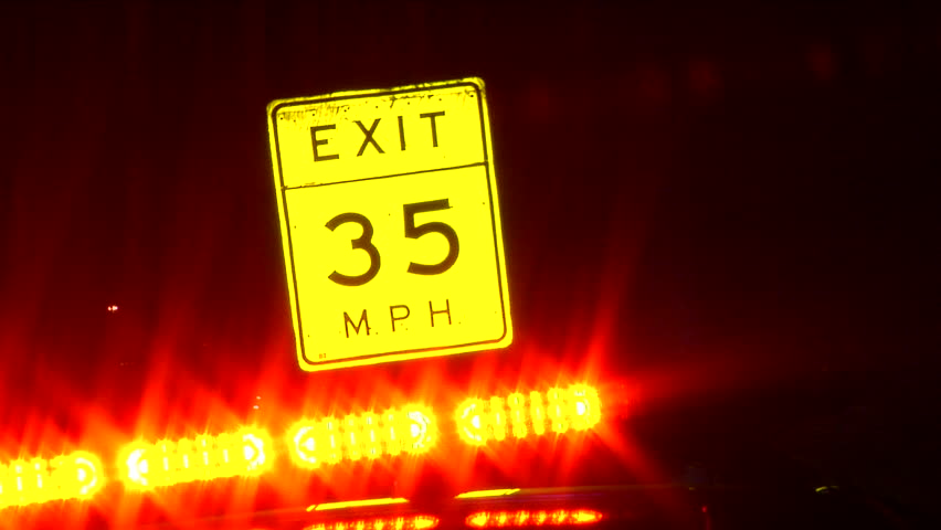 Yellow Speed Limit Sign Illuminated Stock Footage Video (100% Royalty