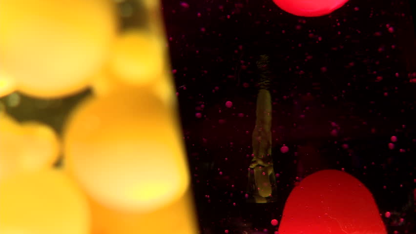 Detail of two lava lamps, useful for abstract backgrounds and patterns.  Focus