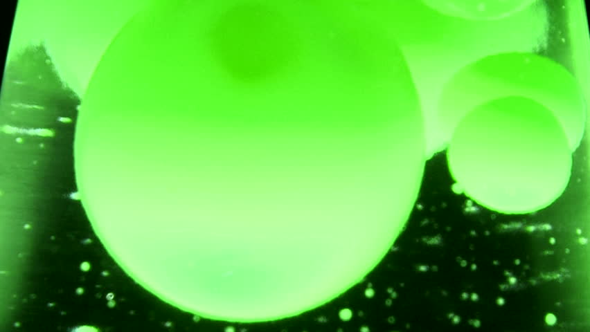 Close up detail of a green lava lamp.
