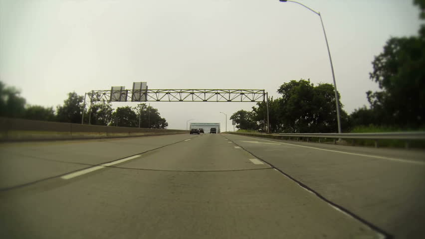 Vehicle point of view of driving over the Ohio River on a bridge on Interstate