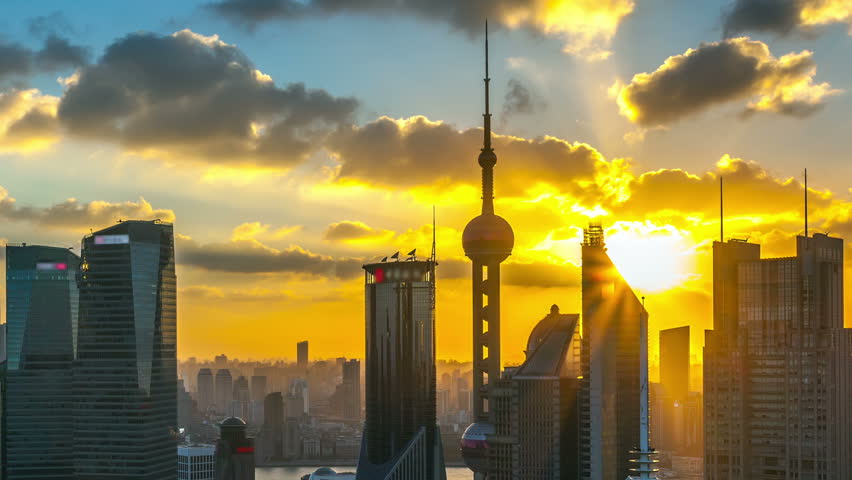 Shanghai, day to night, time-lapse(zoom out). Shanghai financial district in China viewed from skyscraper of Pu-dong.  Search More:"ShanghaiSkyline"