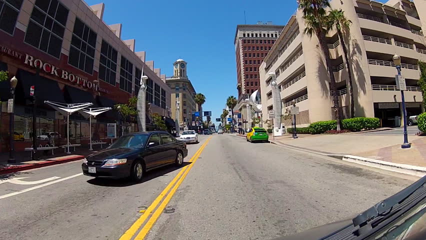 LONG BEACH, CA/USA: July 17, 2013- The camera rolls down Pine Avenue by the