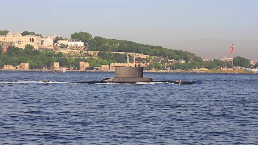 Submarine on the sea surface. Turkish navy submarine passes through Bosphorus as