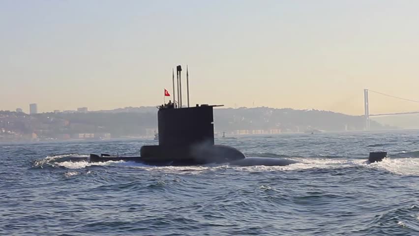 Navy Submarine. Close-up tracking shot. A submarine moving into Bosporus waters.
