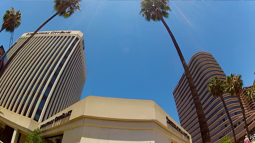 LONG BEACH, CA/USA: July 17, 2013- A low angle vehicle shot of the high rise