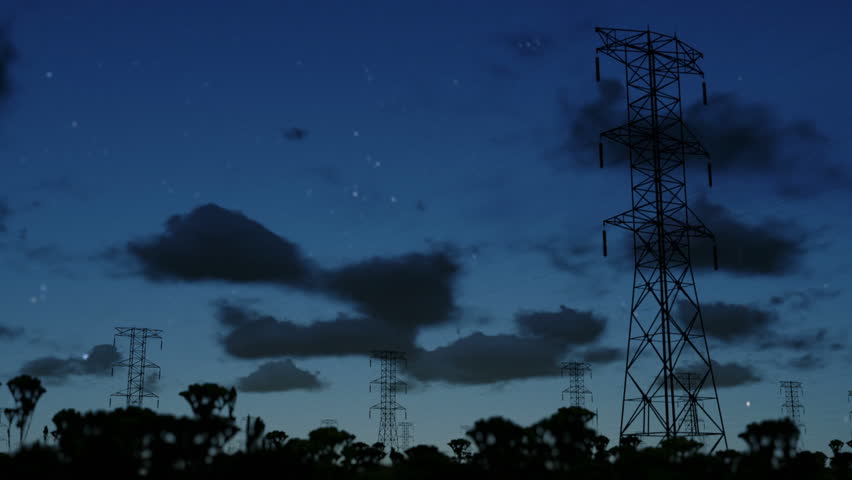 Electricity pillars at night, timelapse clouds