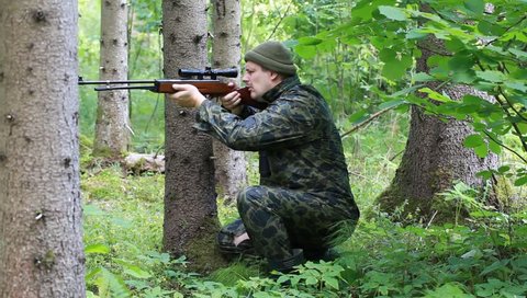 Man with optical rifle and binoculars in the woods episode 5