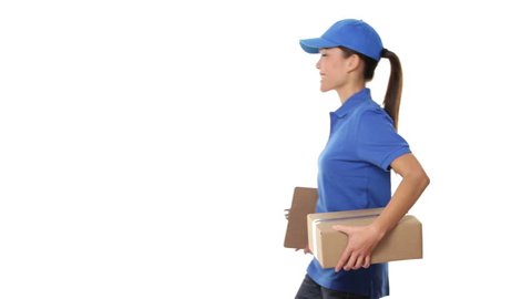 Female package delivery person. Courier giving packages in uniform. Woman courier smiling happy on white background. Beautiful young mixed race Caucasian / Chinese Asian female professional courier.