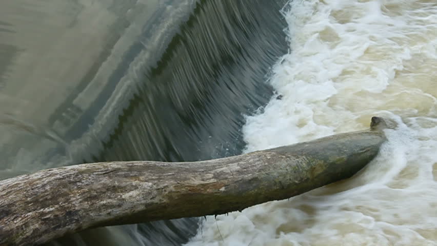 water pouring over the Dam