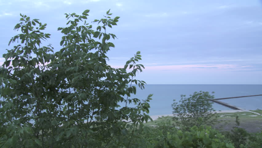 Dawn on the coast of Lake Michigan, looking over the harbor entrance and