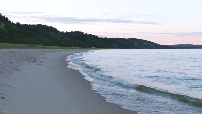 Dawn on the coast of Lake Michigan.  View of the beautiful sandy beach at