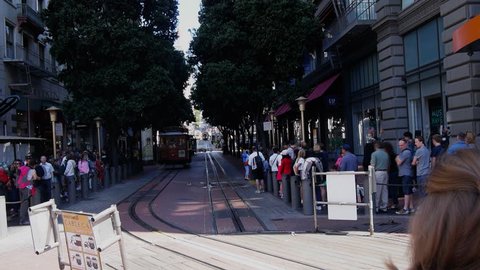 SAN FRANCISCO- JUL 8: time lapse view as drivers turn around a san francisco cable car on  the powell market turntable