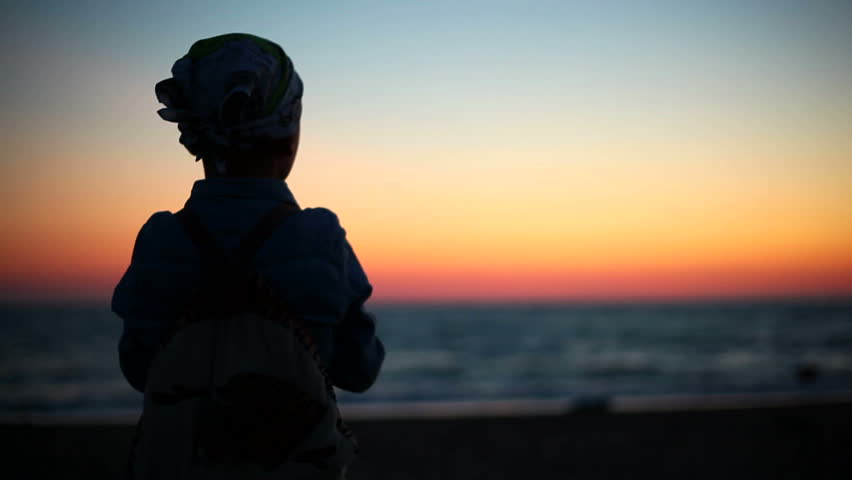 Little boy at sunset | Shutterstock HD Video #4384907