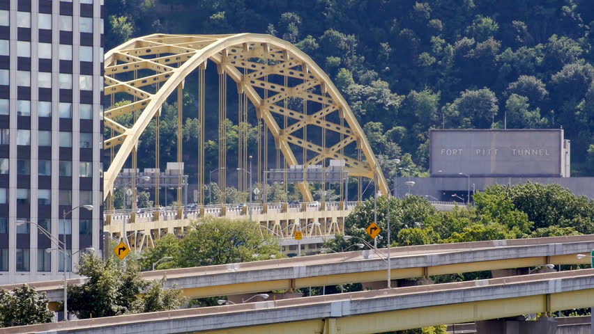 Cars cross the Fort Pitt Bridge into and out of Pittsburgh.