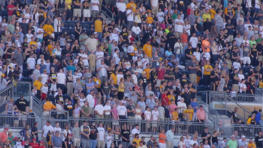 PITTSBURGH, PA, Circa August, 2013 - Fans sing Take Me Out to the Ball Game at a