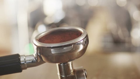 Tamping Fresh Ground Coffee. Shot on RED Digital Cinema Camera in 4K (ultra-high definition (UHD)), so you can easily crop, rotate and zoom, without losing quality!