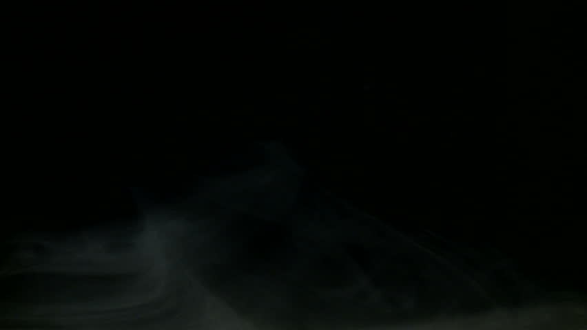 Loopable clip of fog, swelling into the shot and then out again.