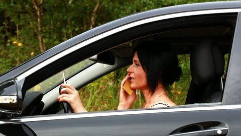 Woman with the phone and lipstick in the car episode 1