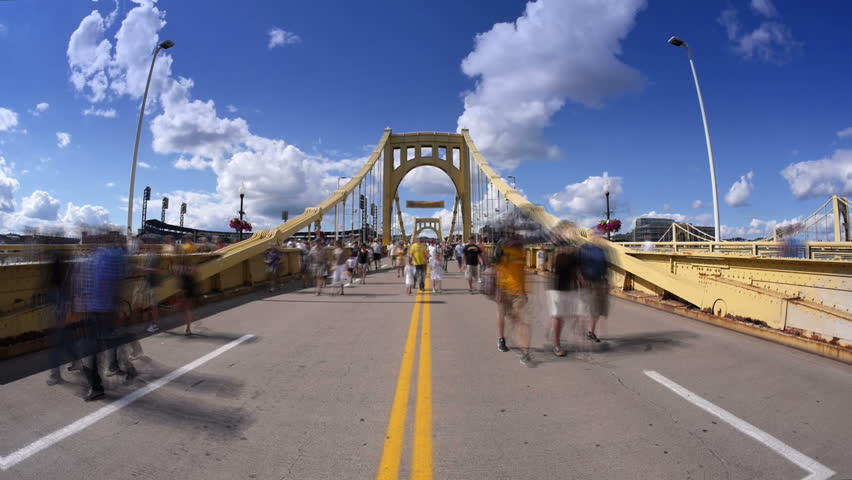 A time lapse view of Pittsburgh Pirates fans walking over the Roberto Clemente