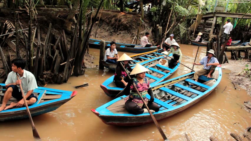 MEKONG DELTA, VIETNAM - JULY 24: boat taxi for tourists on a canal in Mekong,