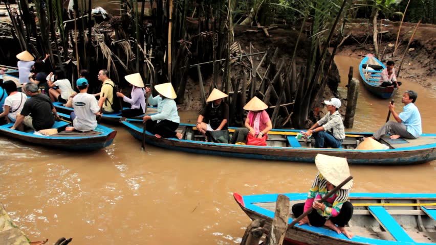 MEKONG DELTA, VIETNAM - JULY 24: boat taxi for tourists on a canal in Mekong,