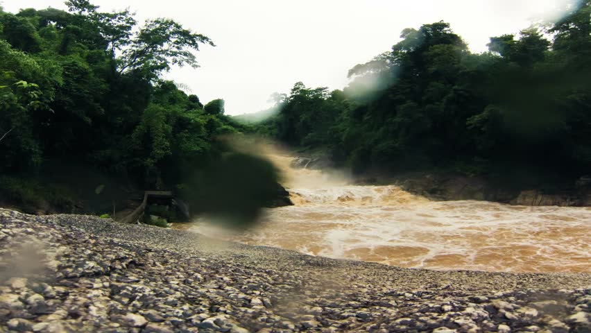 Yang Bay waterfall after a tropical downpour,  Nha Trang, Vietnam. Timelapse.