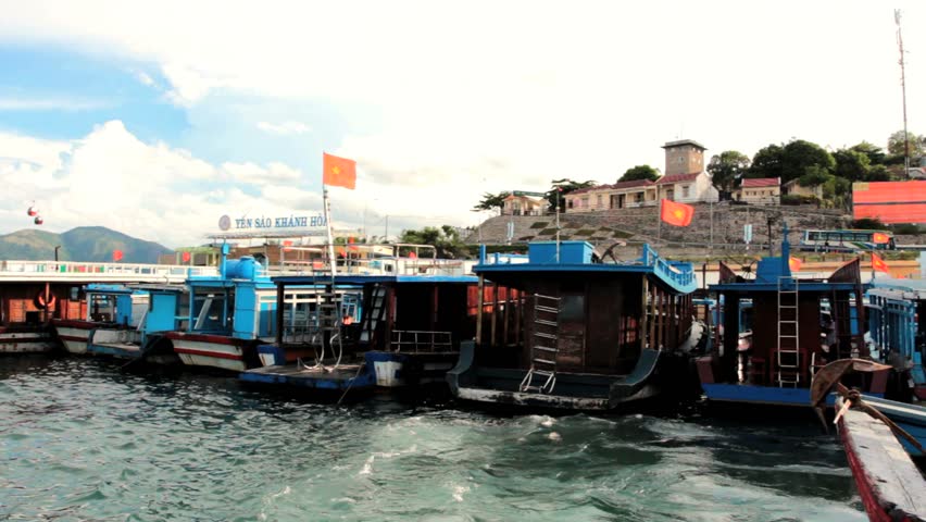 Nha Trang, Vietnam, wharf Area, view from a moving boat of boats passing by