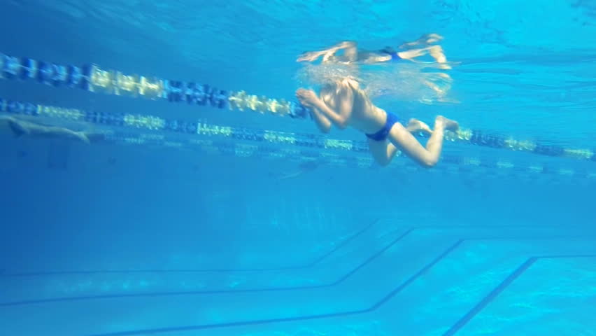 Beautiful underwater view of swimming breaststorke style
