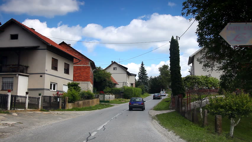 Driving car throu countryside, nature and willage 