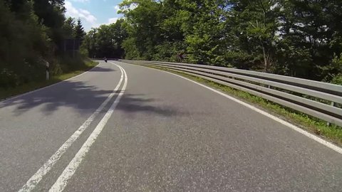 winding road with motorcycle