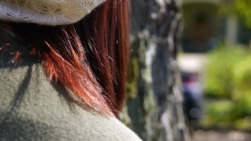 Attractive Teen Friends play hide and seek behind the tree in the park 
