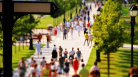 Defocused crowd of people strolling in park of Tzaritzino homestead, Moscow, time-lapse.