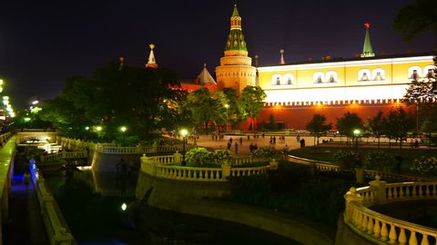 Moscow Kremlin and fountains on Maneznaya square night view, time-lapse.