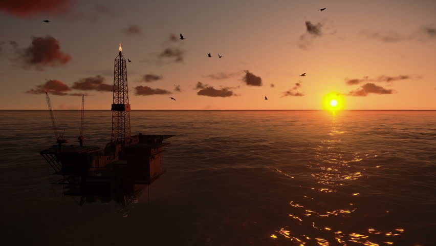 Oil Rig in ocean at sunset, panning