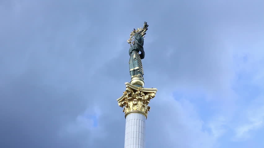 KIEV, UKRAINE - JUNE 16: Main Kiev square Majdan Nezalezhnosti. Woman statue